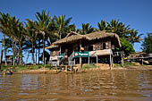 Inle Lake Myanmar. All the buildings are constructed on piles. Residents travel around by canoe, but there are also bamboo walkways and bridges over the canals, monasteries and stupas. 